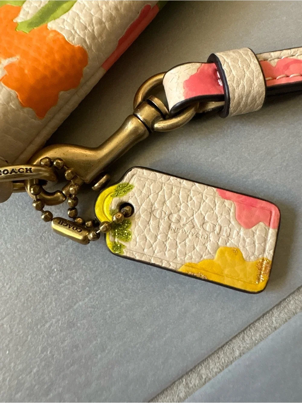 COACH Floral Leather Wristlet in Cream with Yellow, Pink & Green